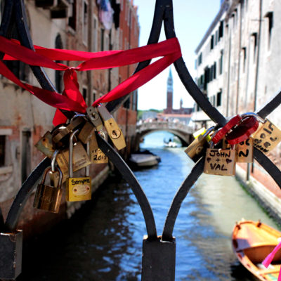 couples celebrate love in italy with a padlock